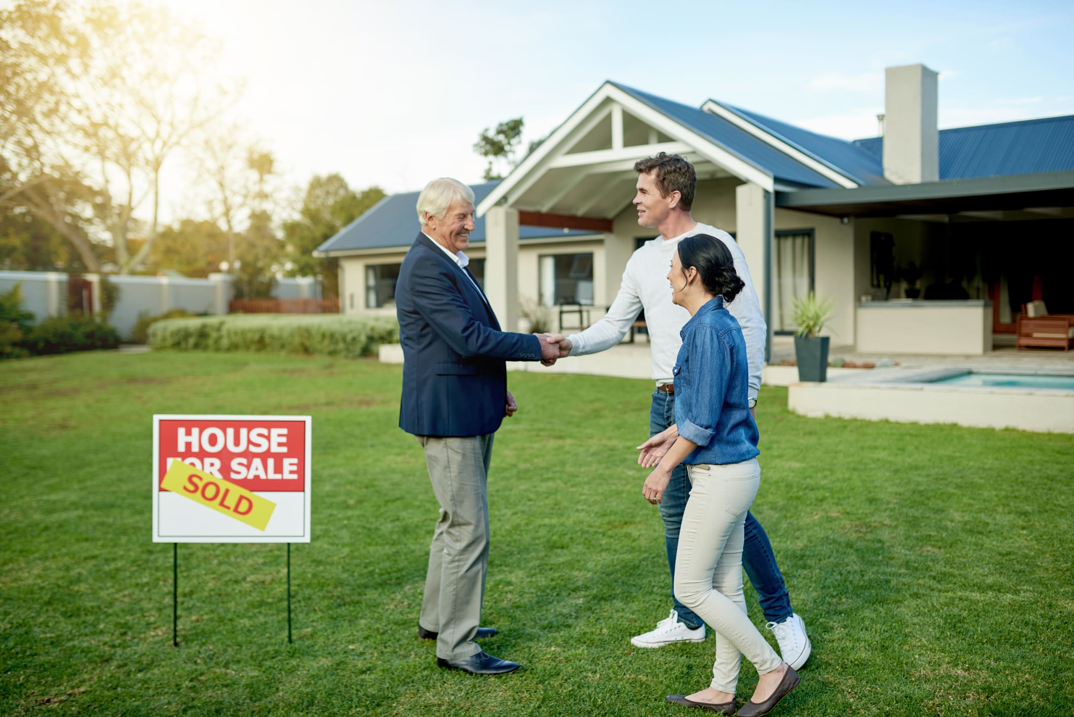 Happy couple with sold home